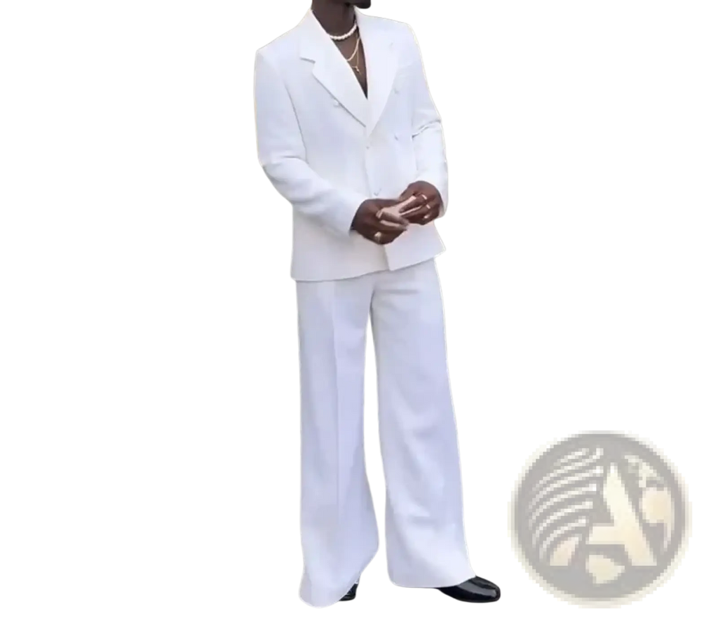 A sharp white double-breasted mens wedding tuxedo suit with wide-leg trousers made of smooth fabric with subtle sheen