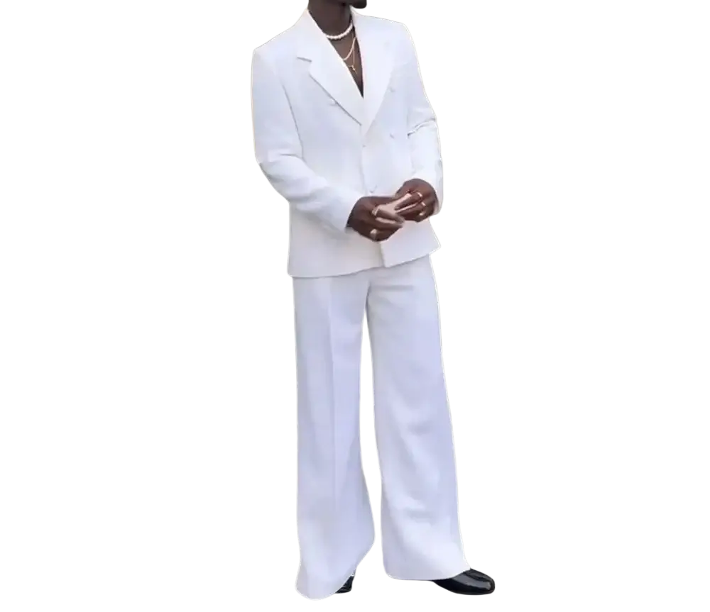 A sharp white double-breasted mens wedding tuxedo suit with wide-leg trousers made of smooth fabric with subtle sheen