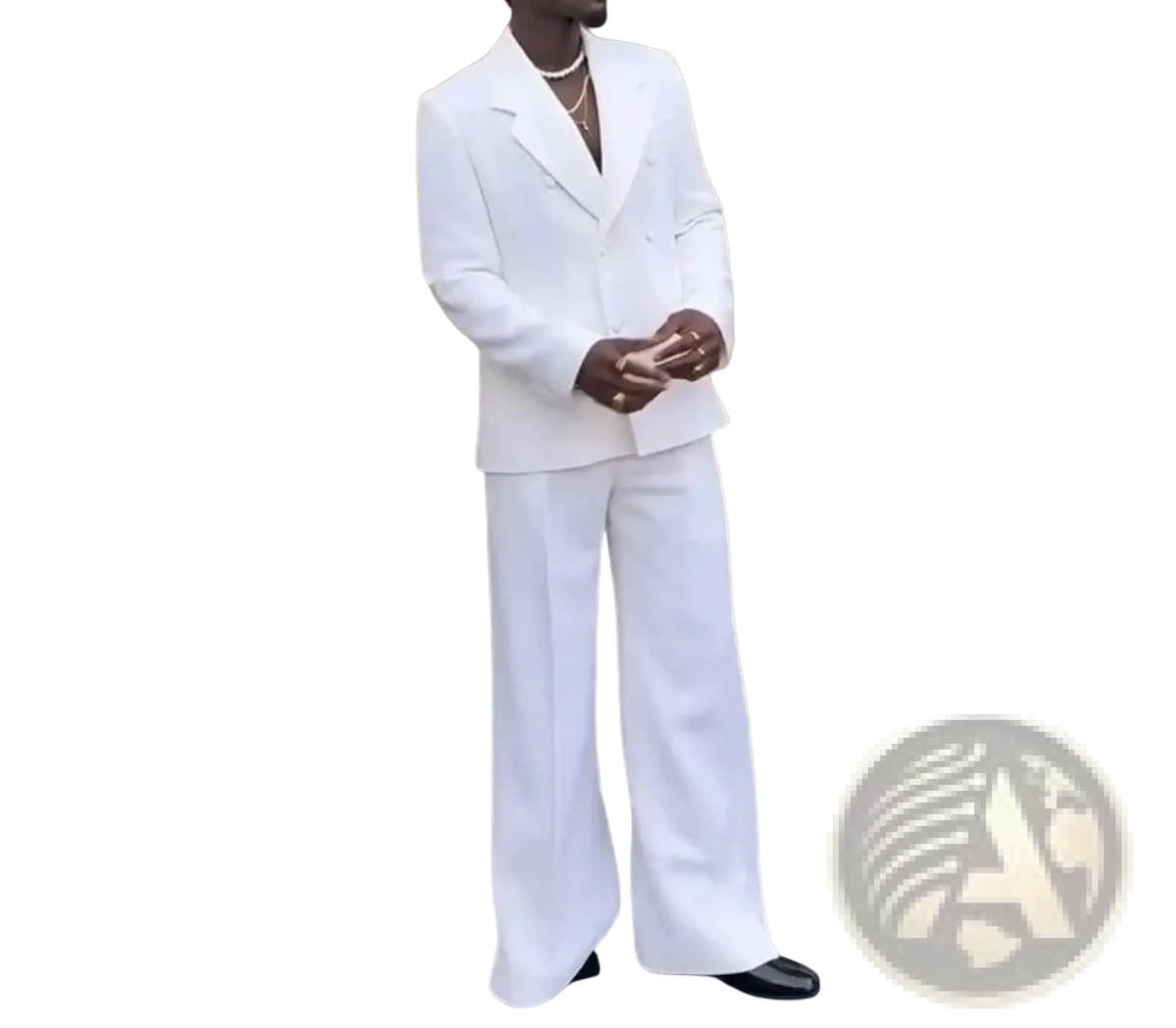 A sharp white double breasted mens wedding tuxedo suit with wide leg trousers crafted from smooth tailored fabric