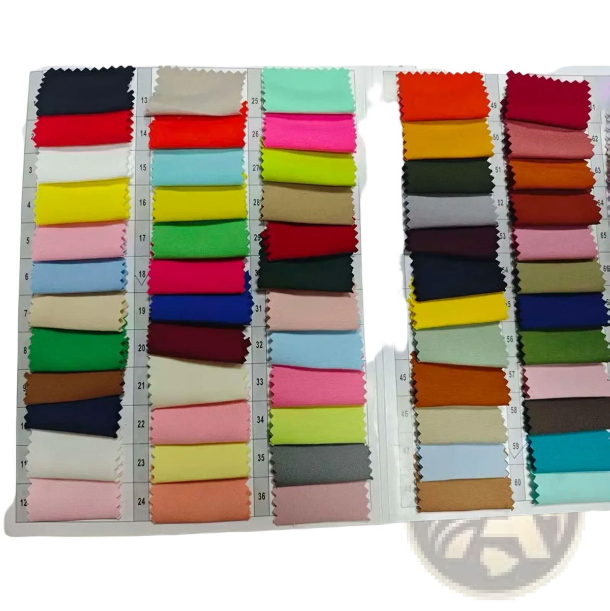 A vibrant assortment of fabric swatches in various colors and textures displayed on a color chart for a white double breasted women pant suit