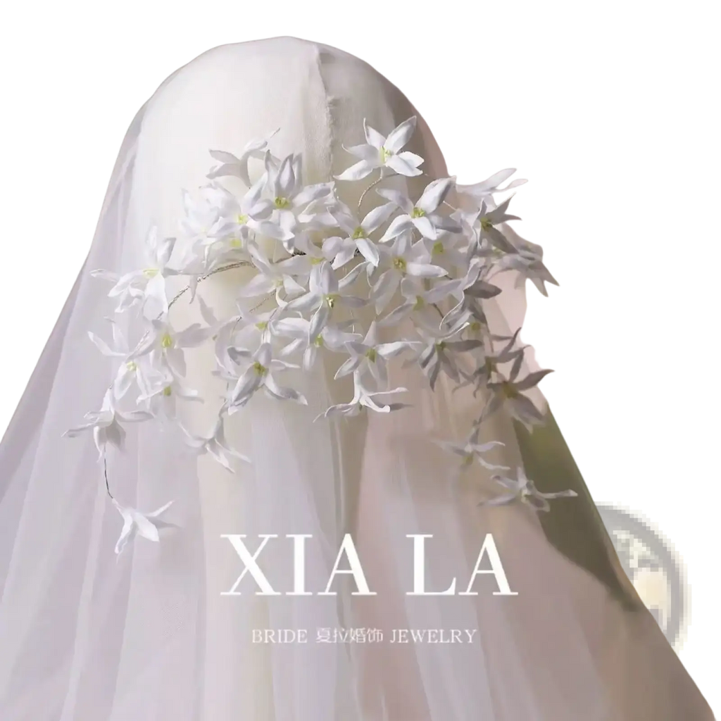 White floral wedding hair crown handmade bridal headpiece with delicate petal details and a soft flowing design