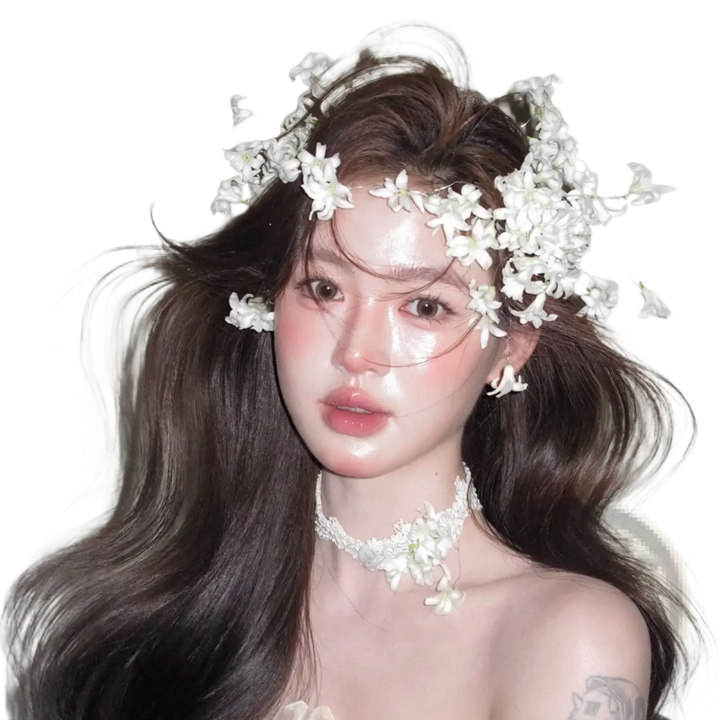 White floral wedding hair crown handmade bridal headpiece with delicate small blossoms and greenery worn as a crown