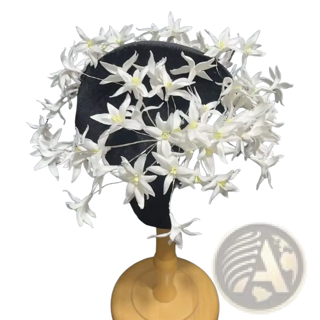 White floral wedding hair crown with delicate star-shaped blossoms and subtle yellow centers handmade bridal headpiece