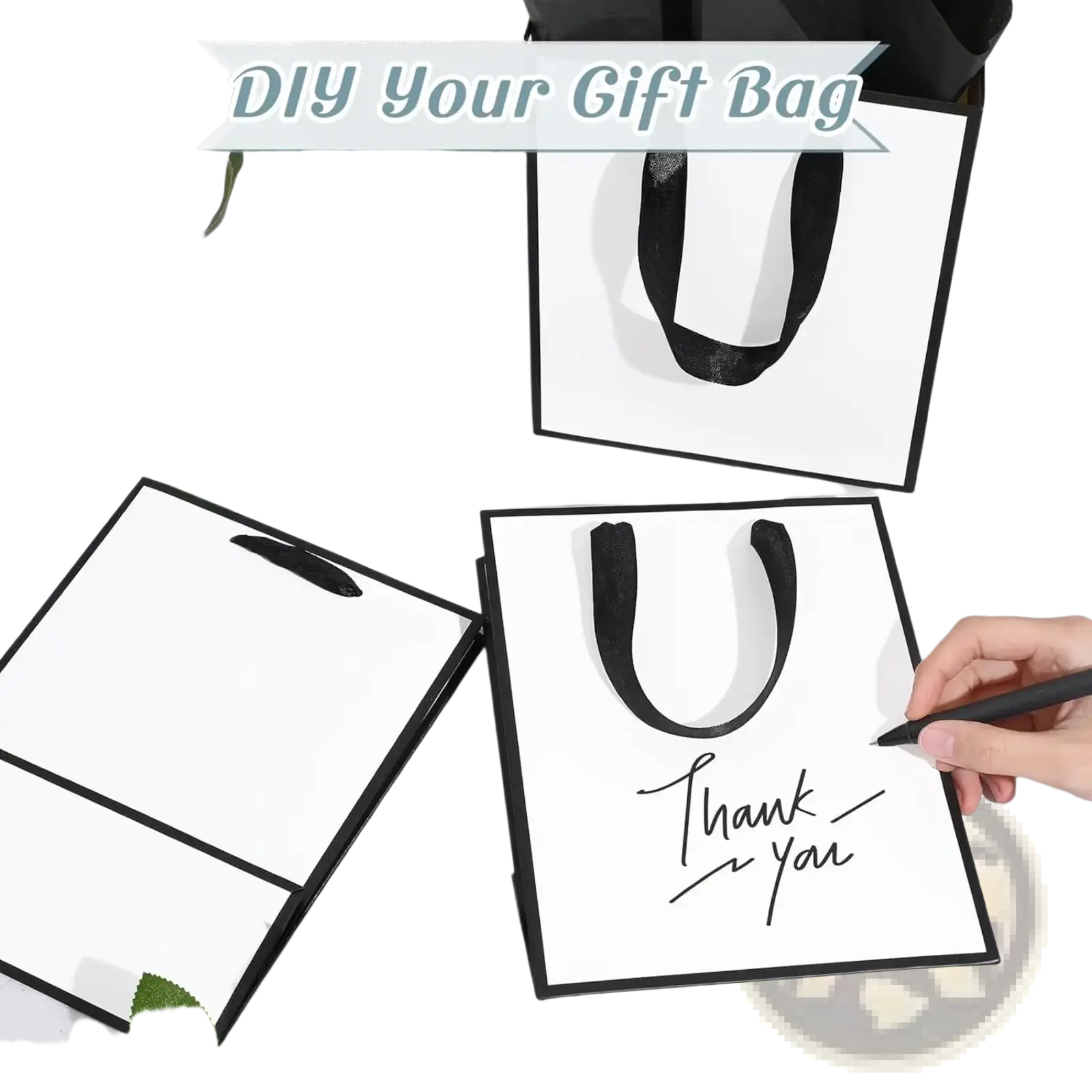 White gift bag with black ribbon handles featuring thank you inscription in elegant cursive script