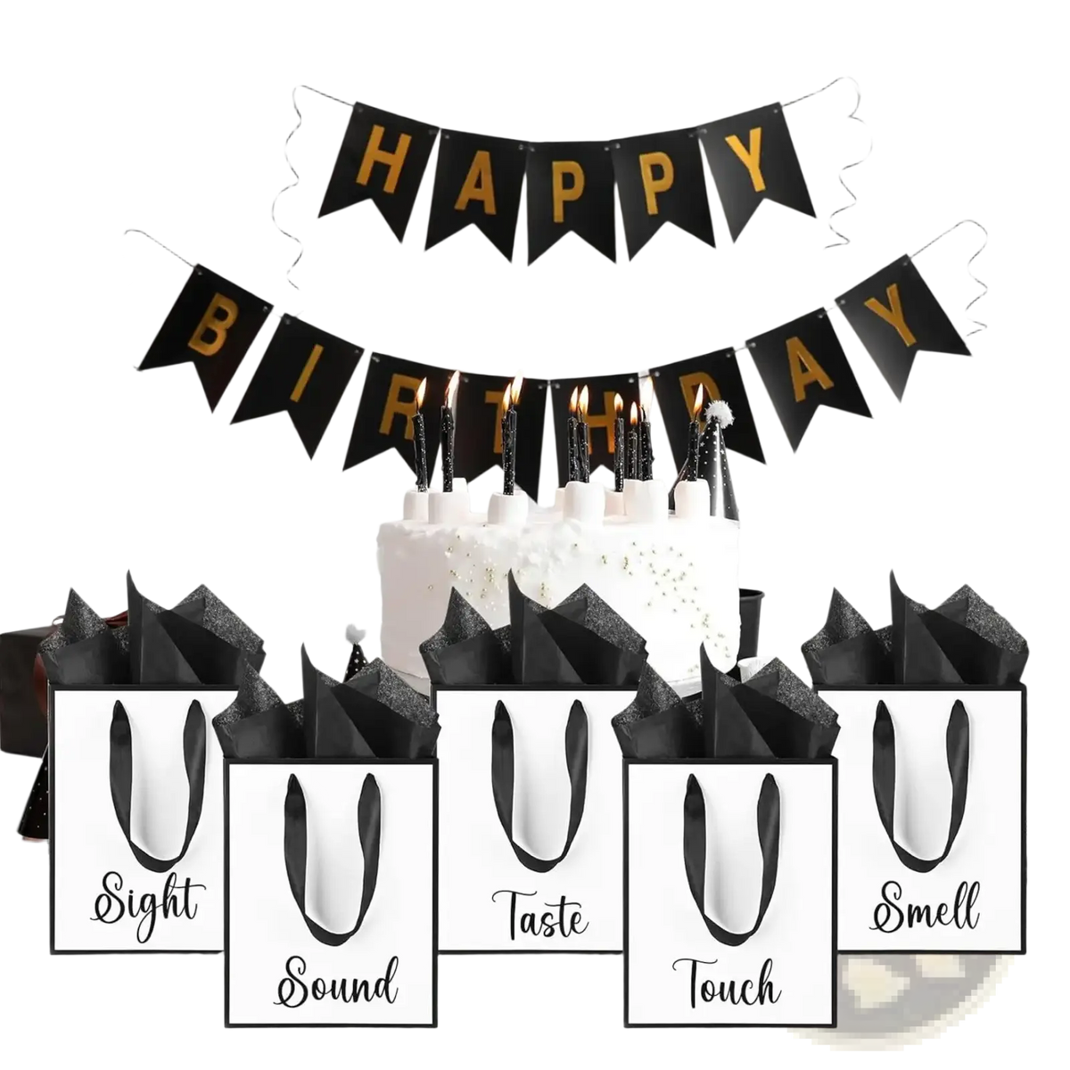 White gift bags with black ribbon handles containing black and white bags labeled with sensory words and black glitter tissue paper