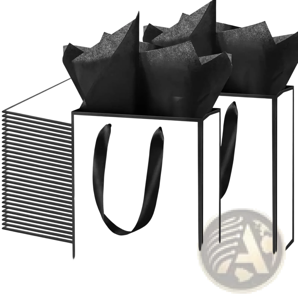 White gift bags with black satin ribbon handles and trim filled with crinkled black tissue paper
