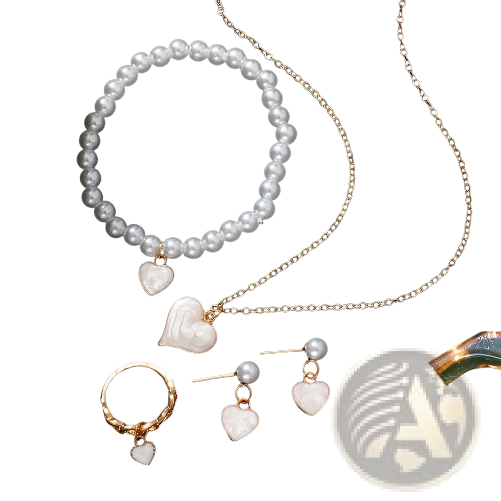 A gold-toned necklace from the white heart and pearl jewelry set featuring white pearls and a mother-of-pearl heart pendant