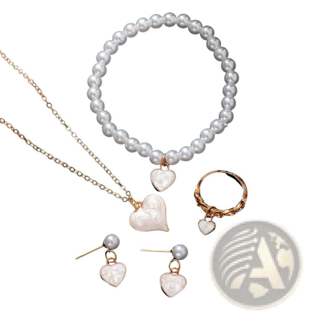 White heart-shaped pendant necklace with gold chain and matching pearl accents from four piece jewelry set