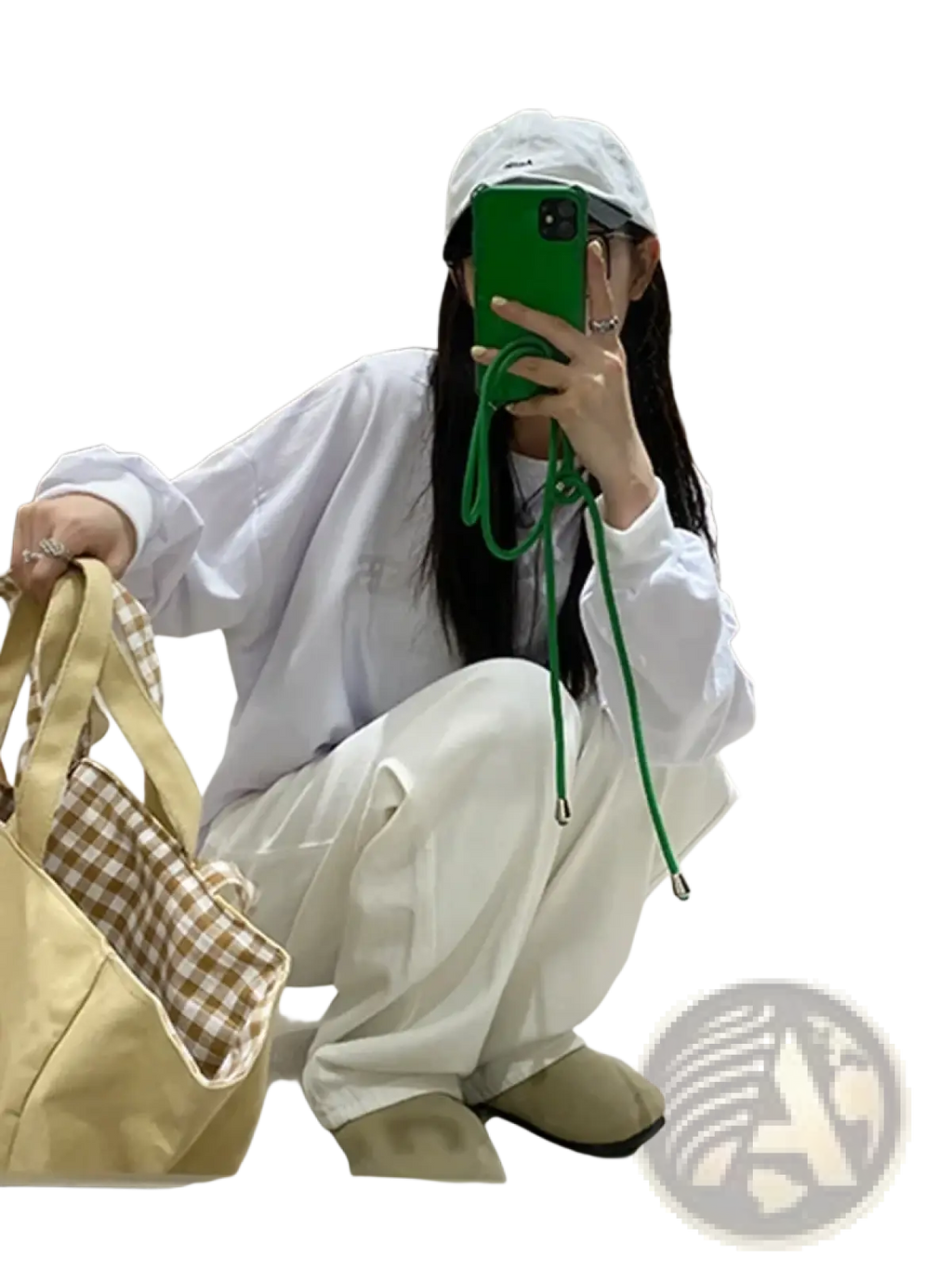 Green phone case with matching cord shown alongside white high waist wide leg jeans for a coordinated look