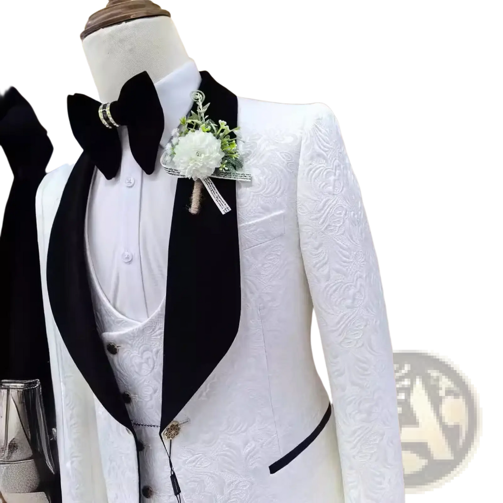 White jacquard tuxedo suit for men with black satin lapels and matching vest featuring embossed floral patterns