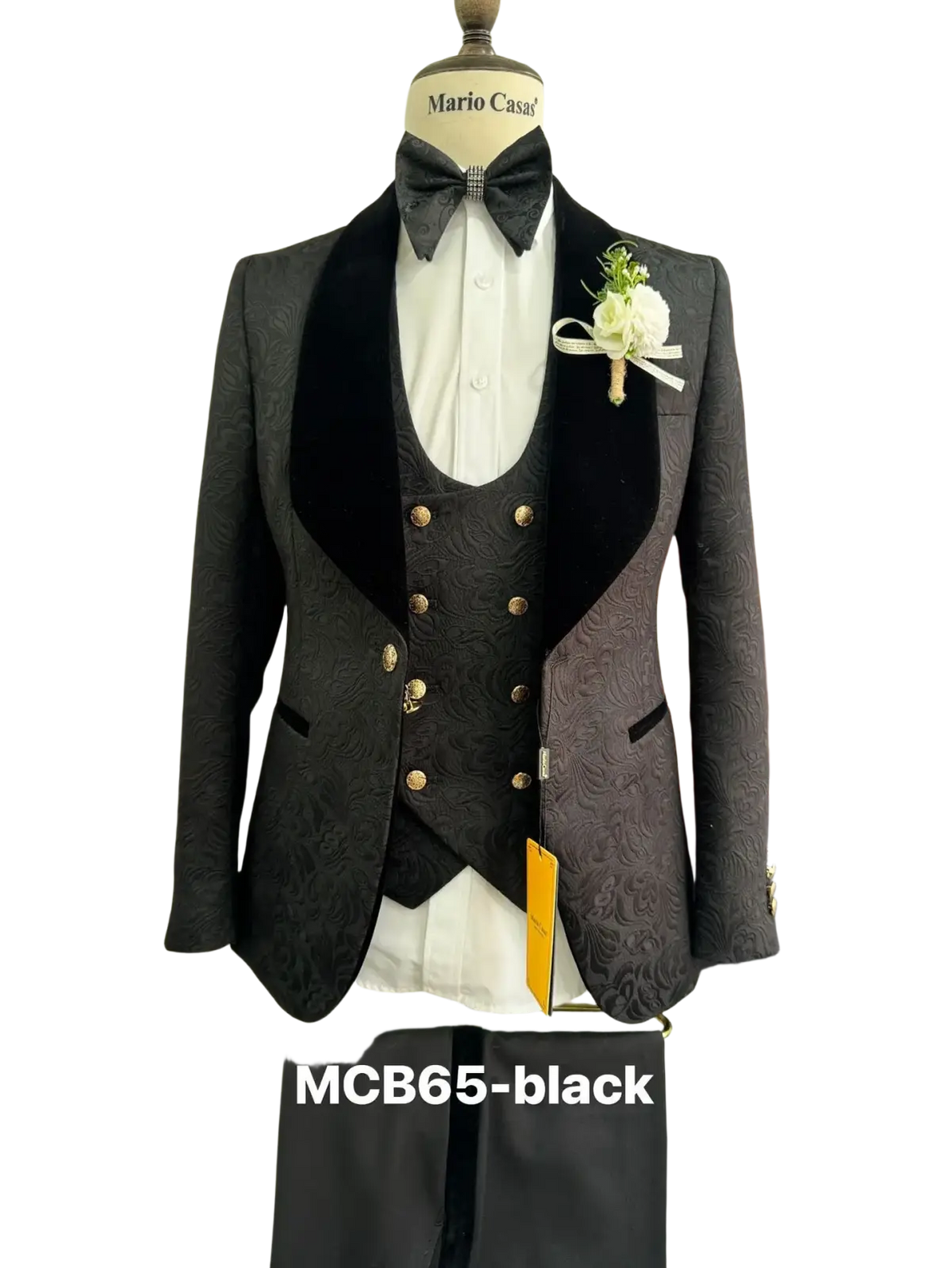 Black textured tuxedo suit for men with velvet lapels and gold buttons displayed on a mannequin