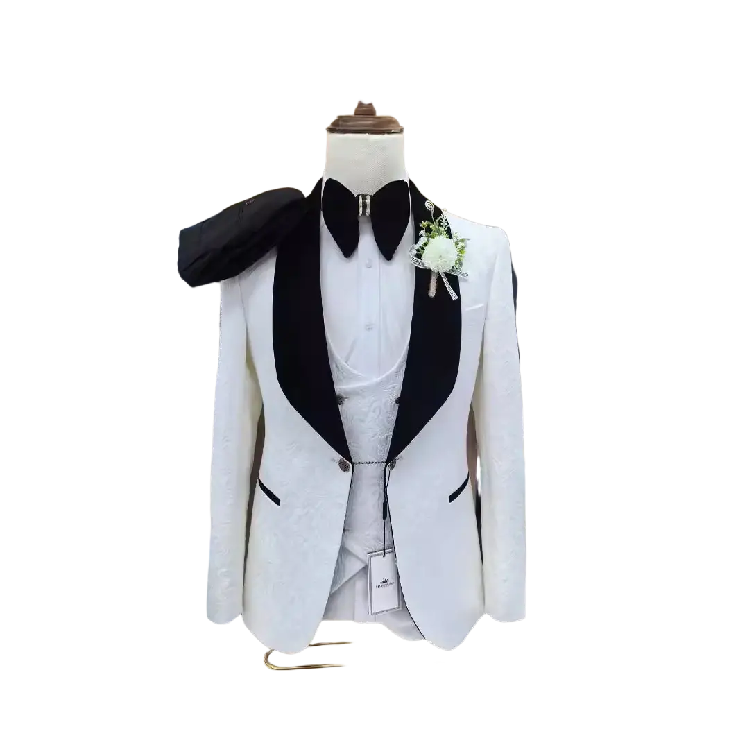 White jacquard tuxedo suit for men featuring a white jacket with black satin lapels and matching bow tie on mannequin