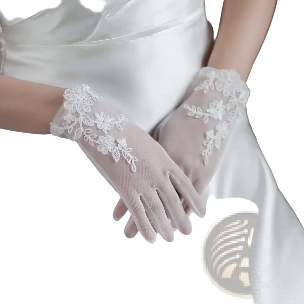White lace bridal gloves in short design with delicate floral embroidery and tulle applique for wedding use