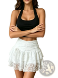 White tiered lace mini skirt with ruched waistband and delicate floral embroidery in the white lace halter set