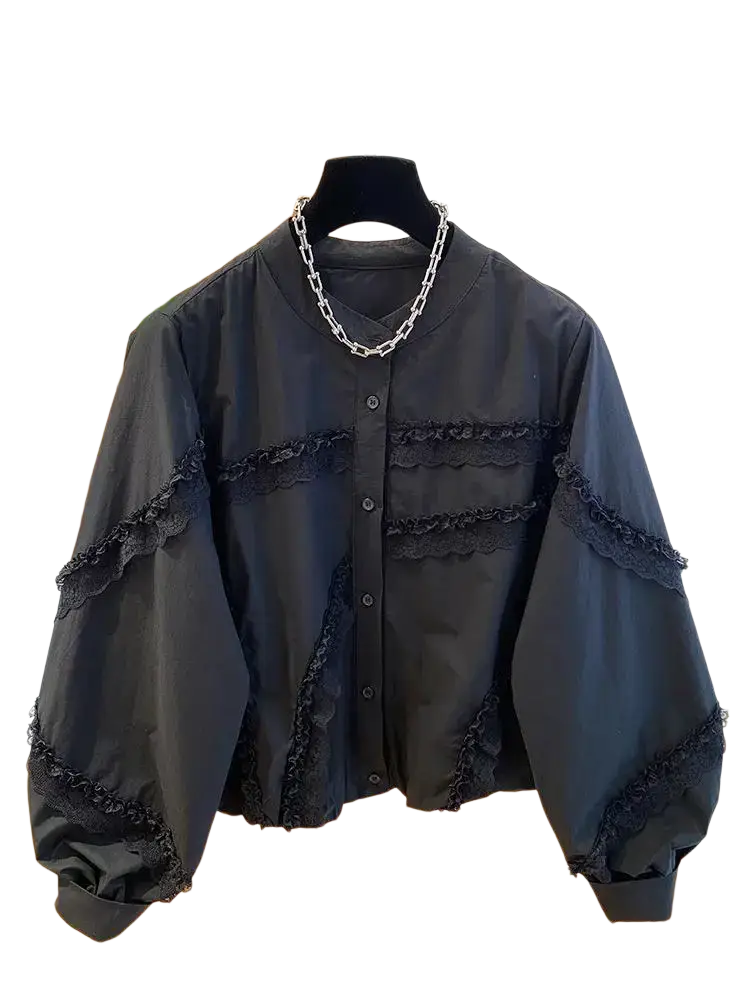 Black blouse with lace trim and chain necklace suitable for spring autumn wear in elegant lace detailing