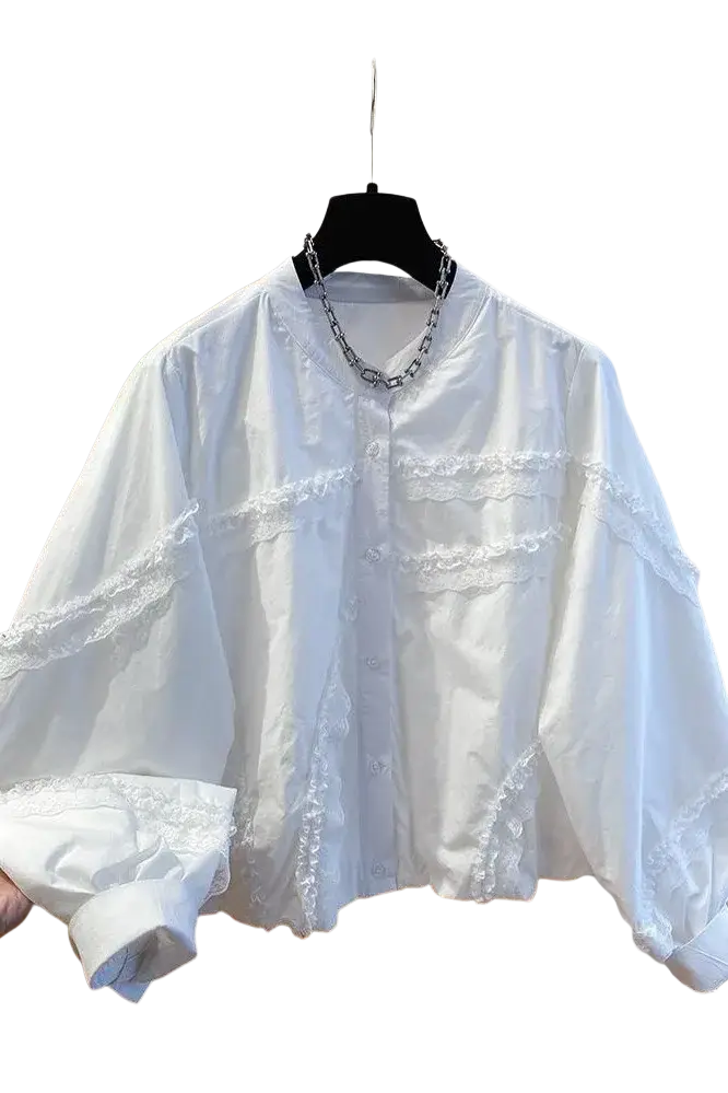 White lace ruffle blouse in spring autumn style with delicate lace trim on neckline sleeves and front pockets
