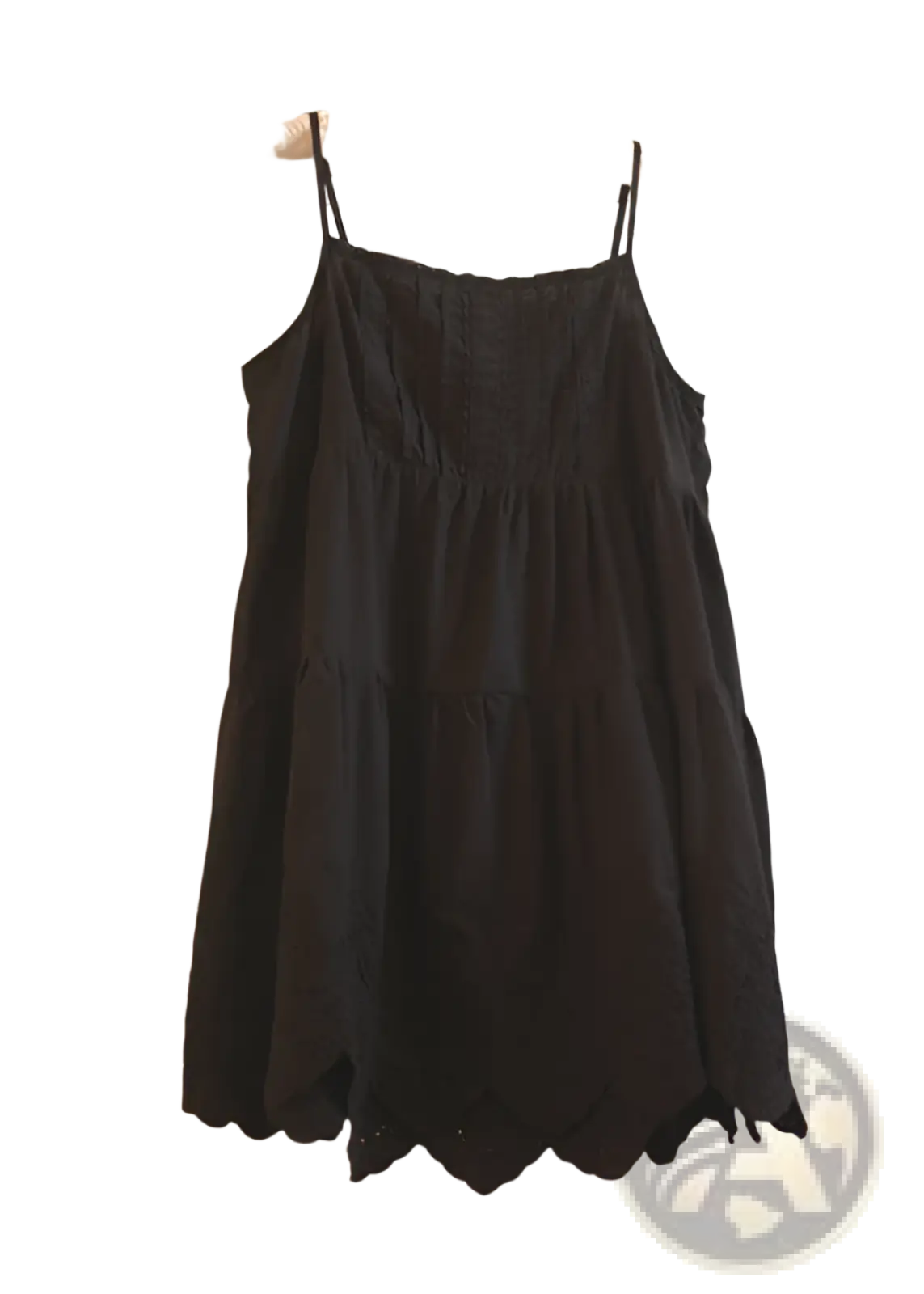 Black eyelet lace tiered dress with thin spaghetti straps and scalloped hem in elegant sundress style
