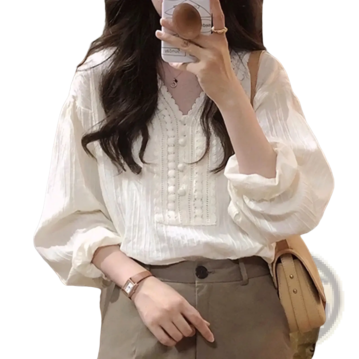 White lace v-neck blouse with delicate lace detailing and gathered puff sleeves in soft white fabric