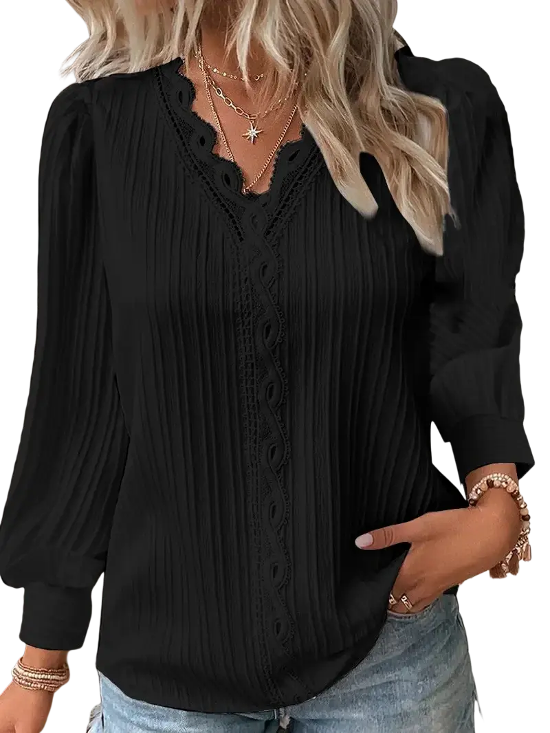 Black pleated blouse with delicate lace detailing along the neckline and front placket made of synthetic fiber