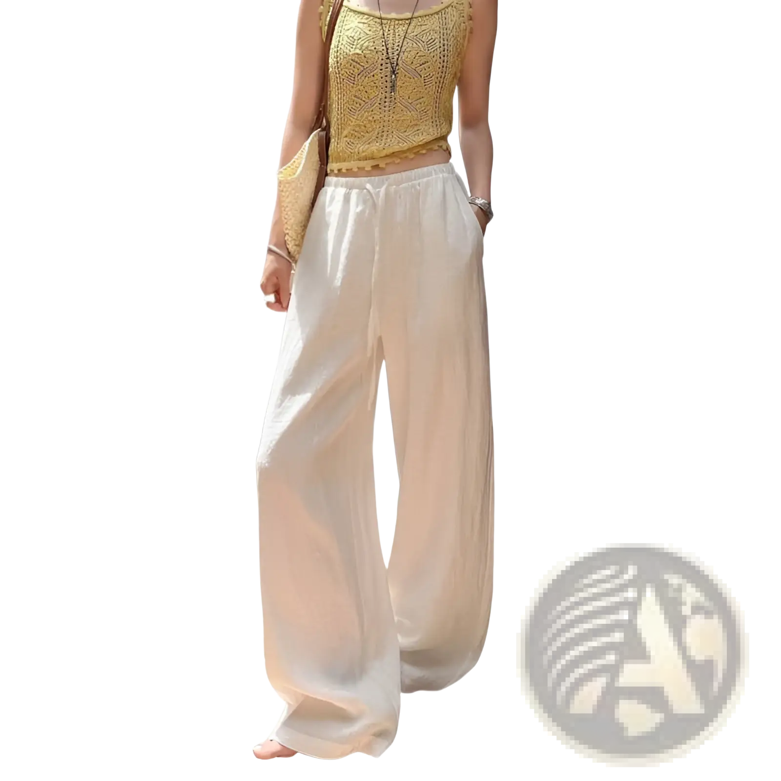 Cream-colored white linen wide leg pants with flowing fabric and a drawstring waist for comfortable wear