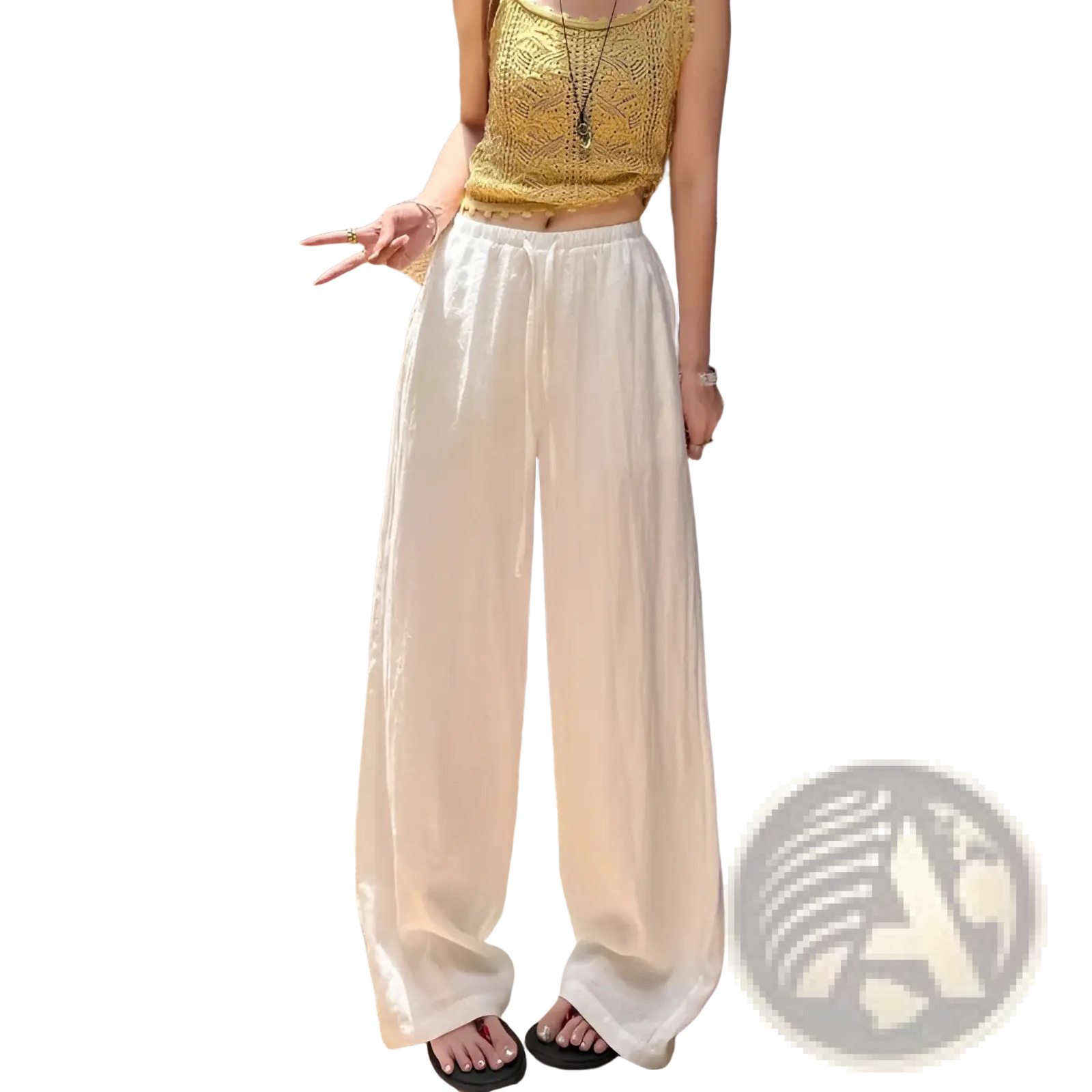 White linen wide leg pants featuring an elastic waistband for comfortable and stylish wear