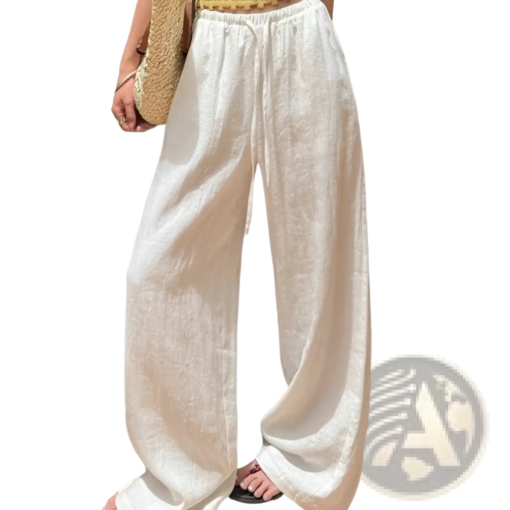White linen wide leg pants with a drawstring waistband designed for comfort and breathable style