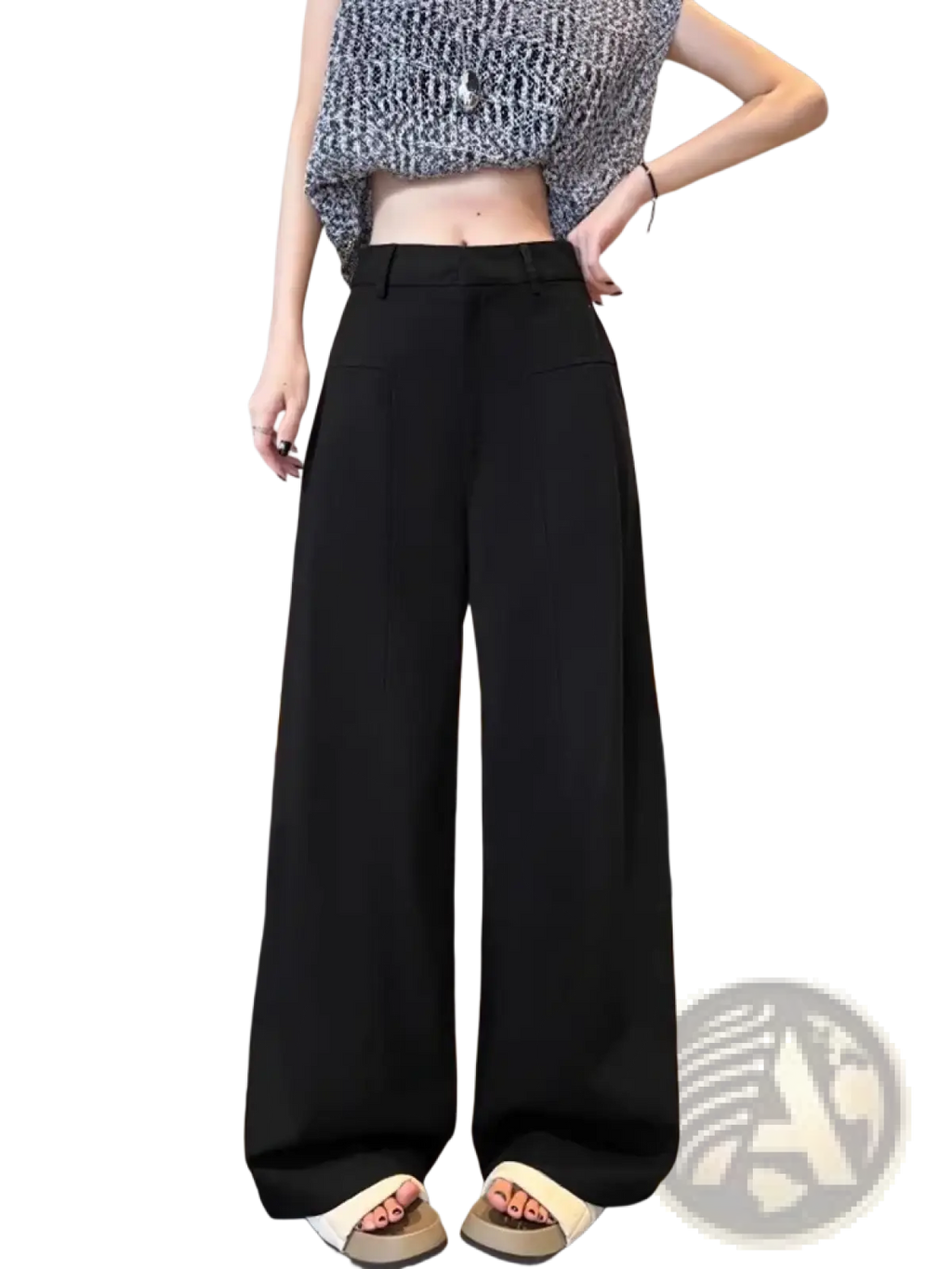 Black high-waisted wide-leg trousers with a sleek tailored fit shown from the back in contrast to white linen styling