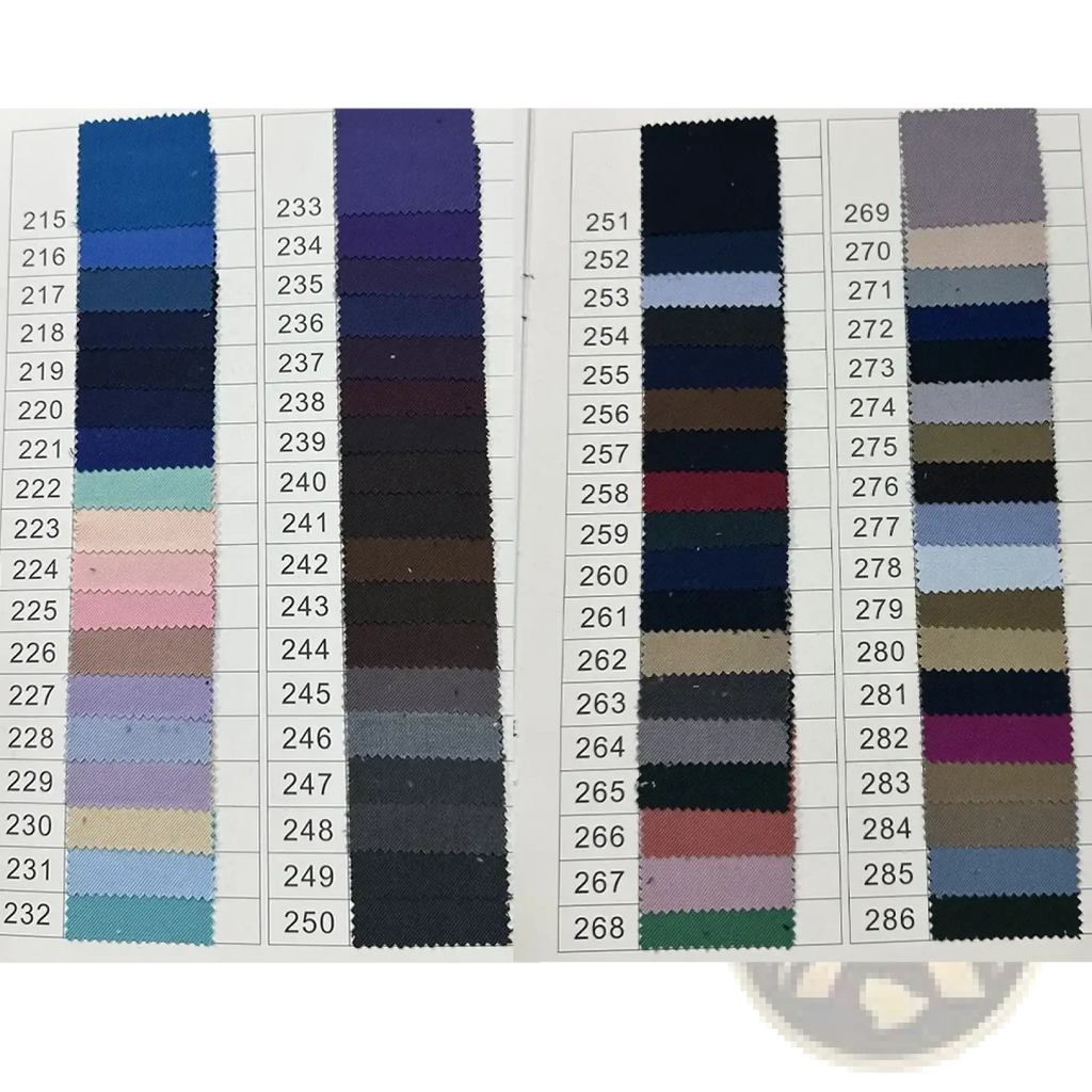 A fabric swatch book displaying various colored textile samples for a white men suit peak lapel blazer set