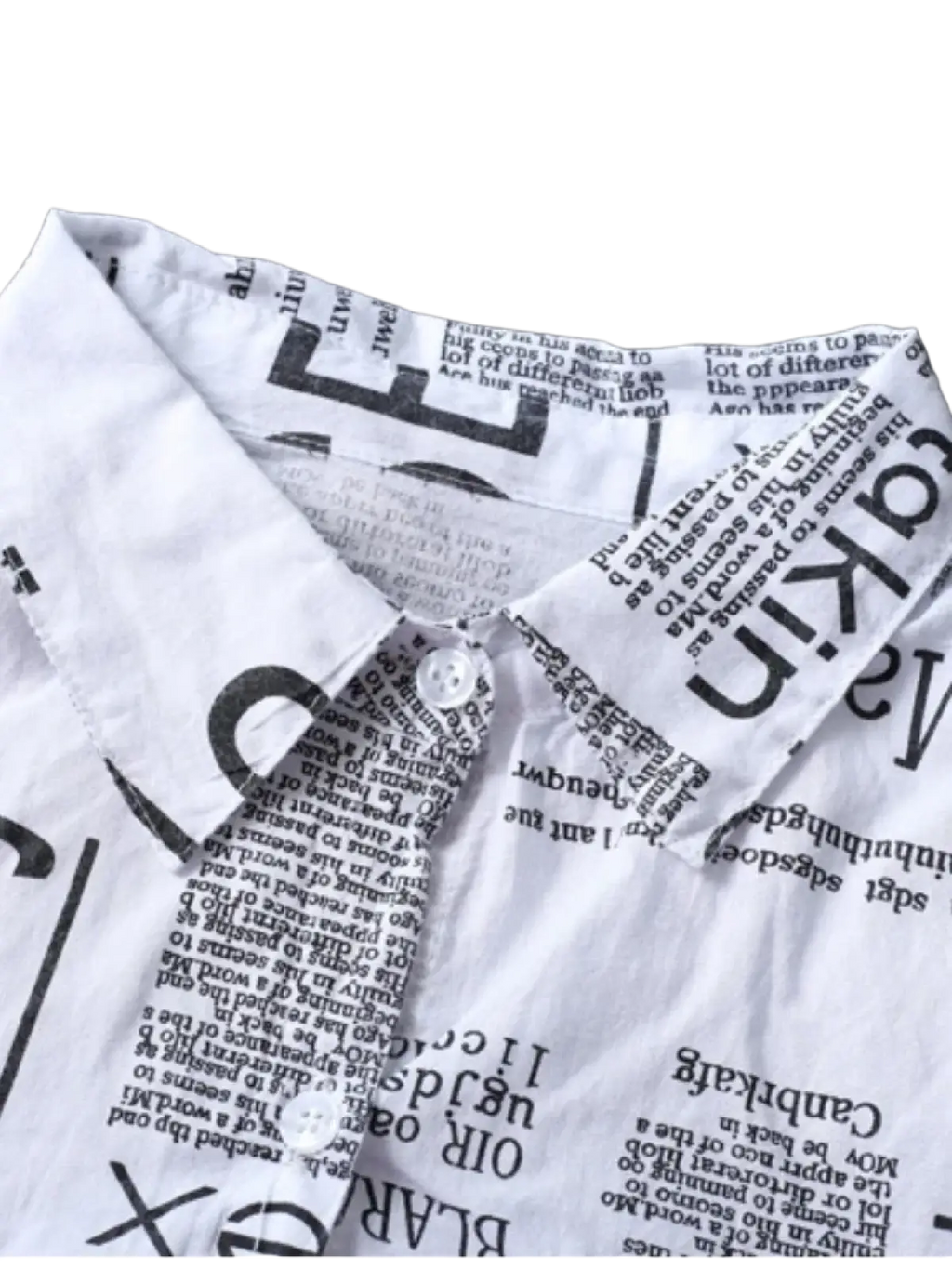 White linen oversized button-up shirt with black newspaper print design showcasing the front side