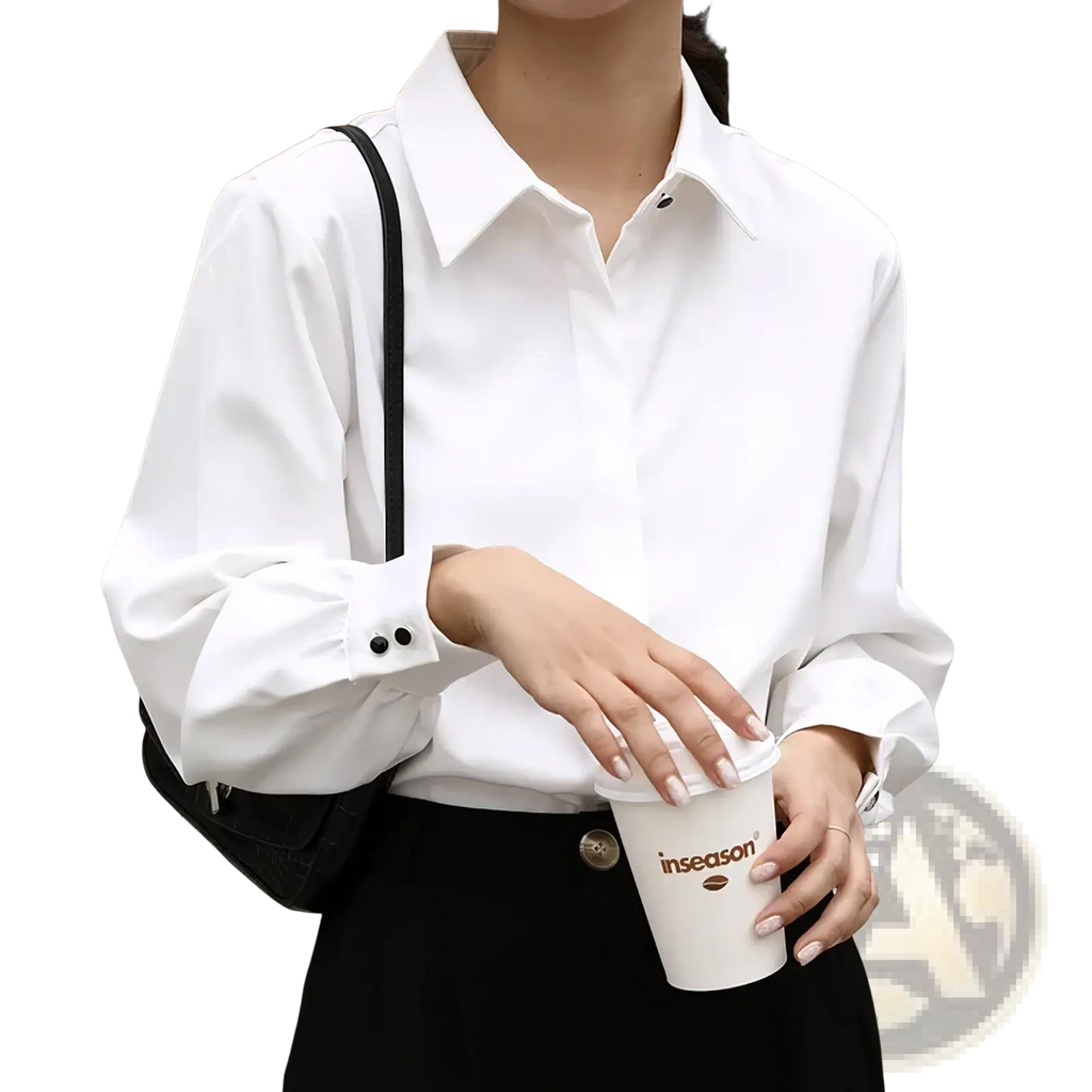 White office blouse long sleeve button down shirt with black buttons and classic collar in cotton fabric for formal wear