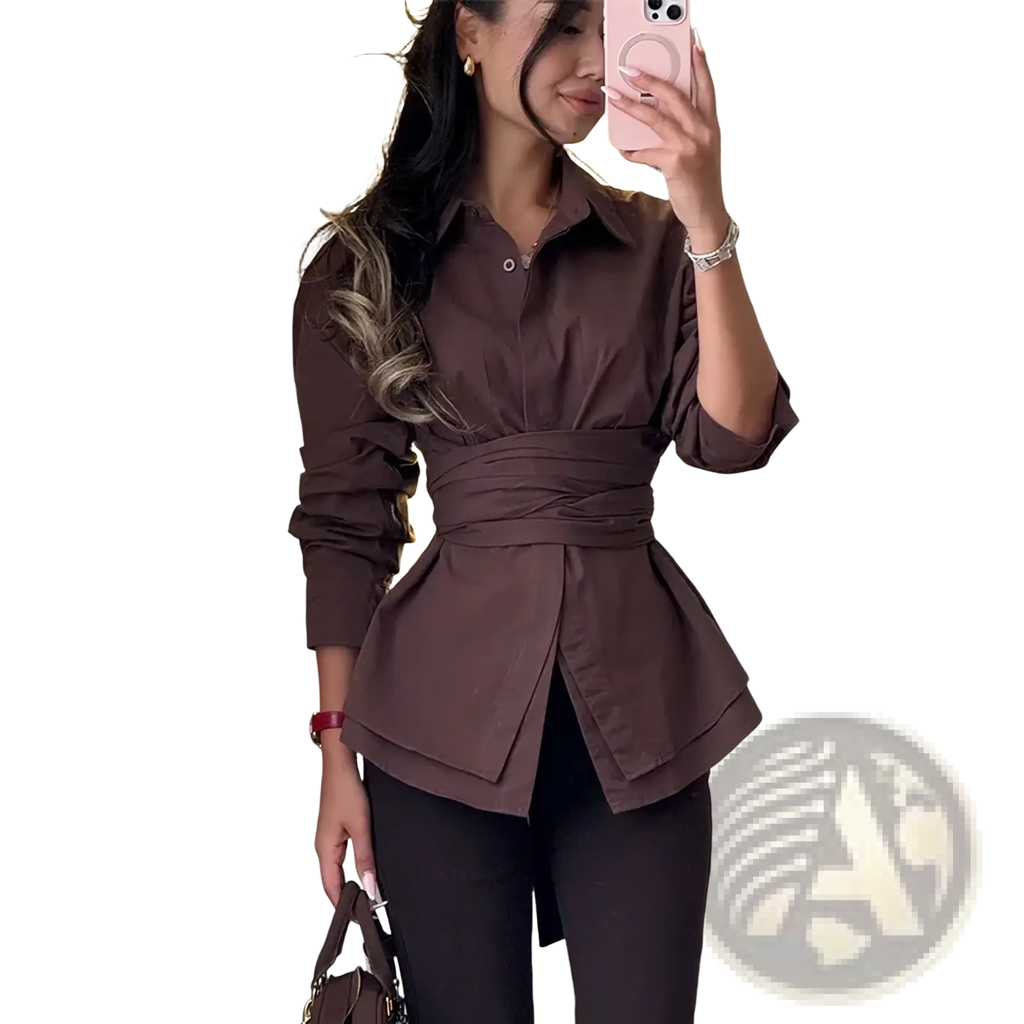 A stylish brown peplum blouse with ruched sleeves and cinched waist in a vintage turn down collar design