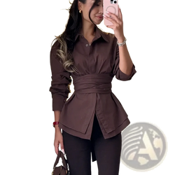 A stylish brown peplum blouse with ruched sleeves and cinched waist in a vintage turn down collar design