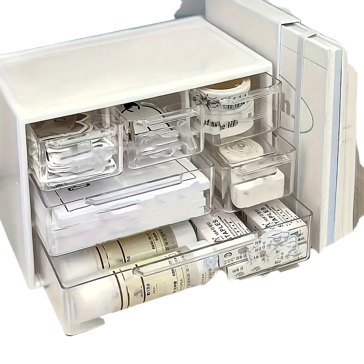 White plastic desk organizer with clear acrylic drawers holding rolls of tape and various office supplies