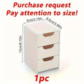 White plastic desk organizer with three drawers and brown handles for efficient workspace storage