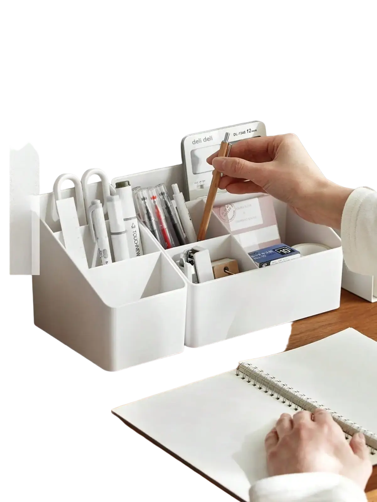 White plastic desk organizer with ladder-style compartments holding pens scissors and stationery for desk use