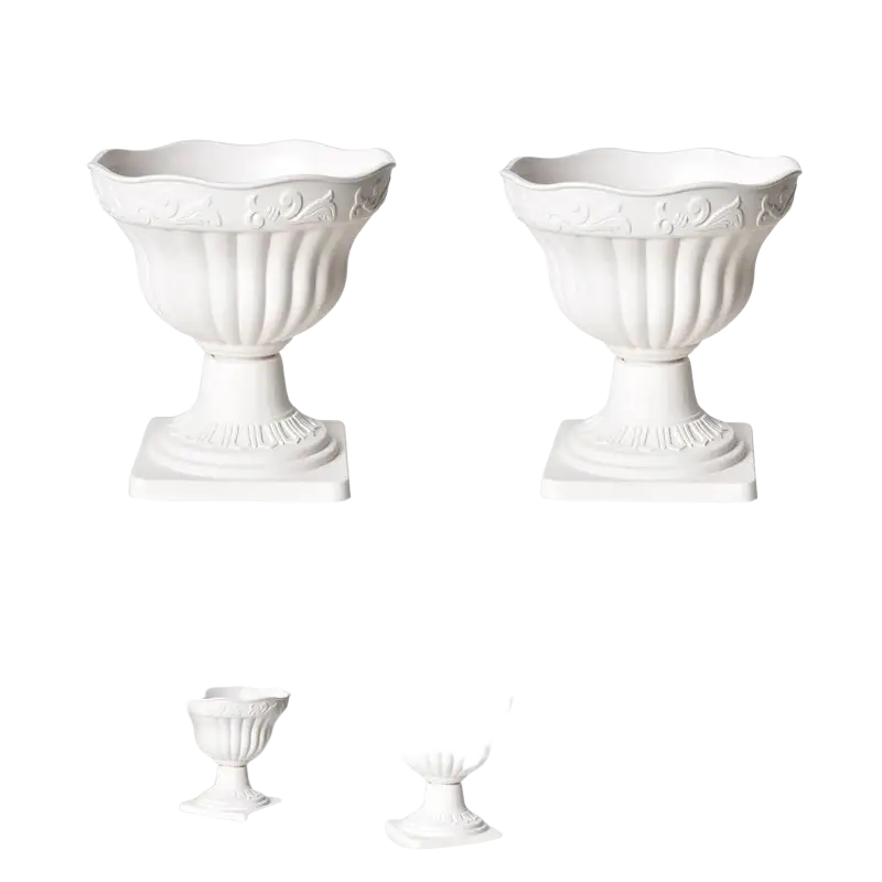 White plastic roman column planter pot with fluted sides and ornate embossed detailing resembling a ceramic urn