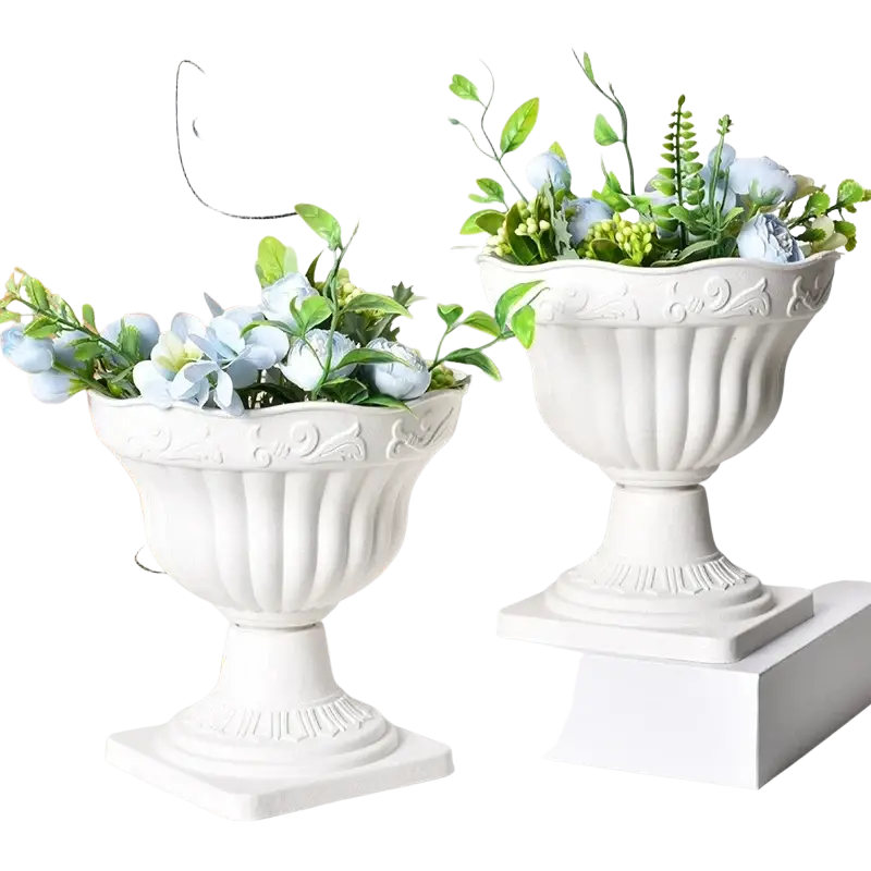 White plastic roman column planter pot with white ceramic urns featuring ornate fluted detailing and scalloped rims