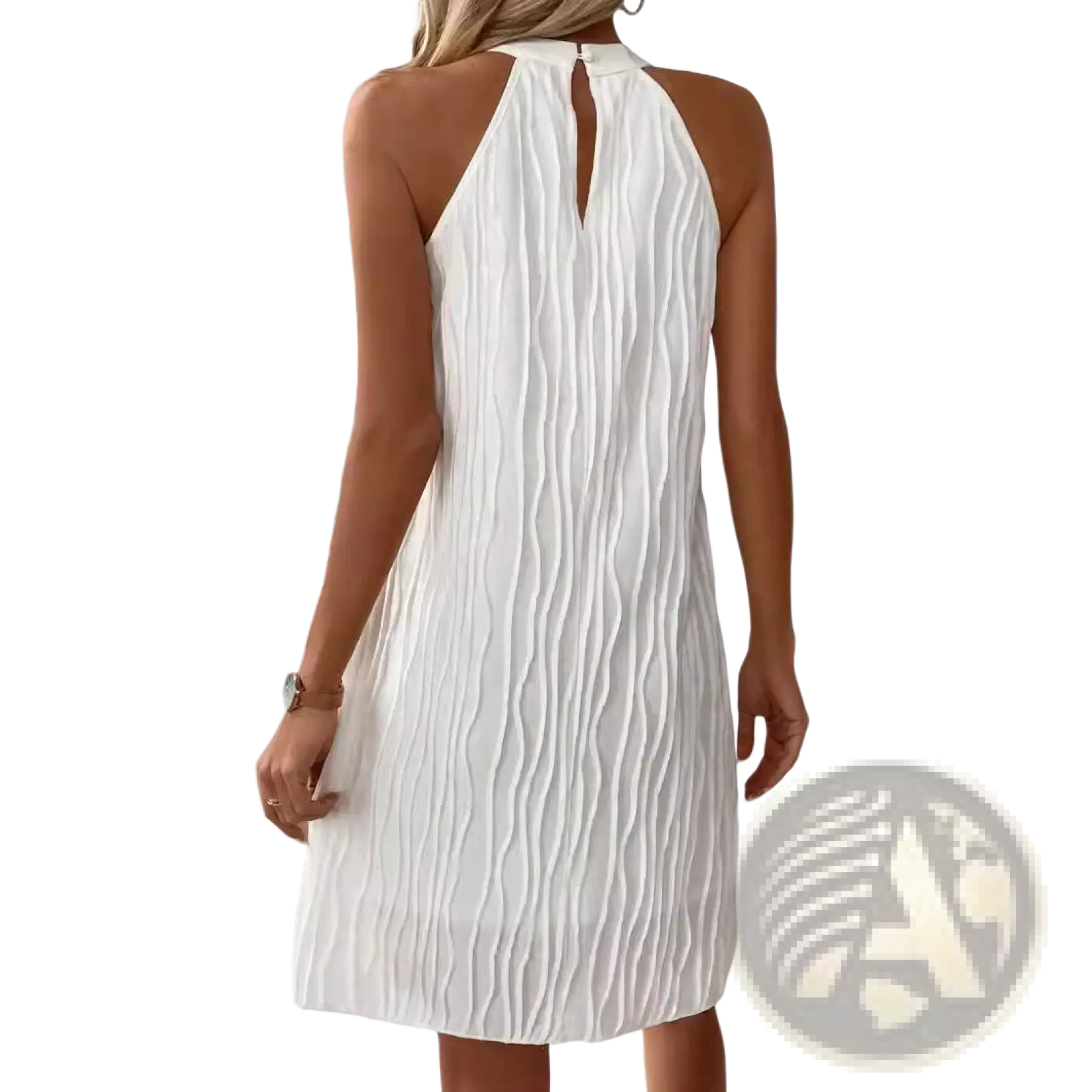 White pleated halter neck dress for women showing back keyhole detail and backless design in lightweight fabric