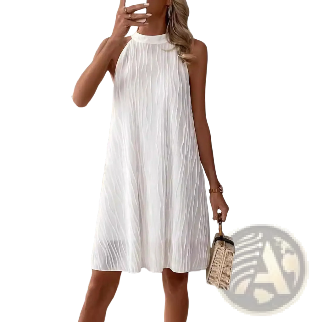 White pleated halter backless dress for women featuring a sleeveless high neck with vertical pleats displayed from the back