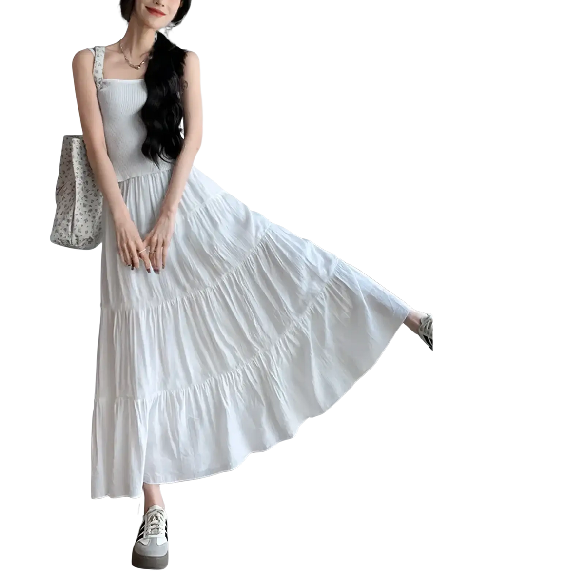 White pleated tiered maxi skirt with ribbed bodice and flowing skirt in breathable fabric for elegant occasions
