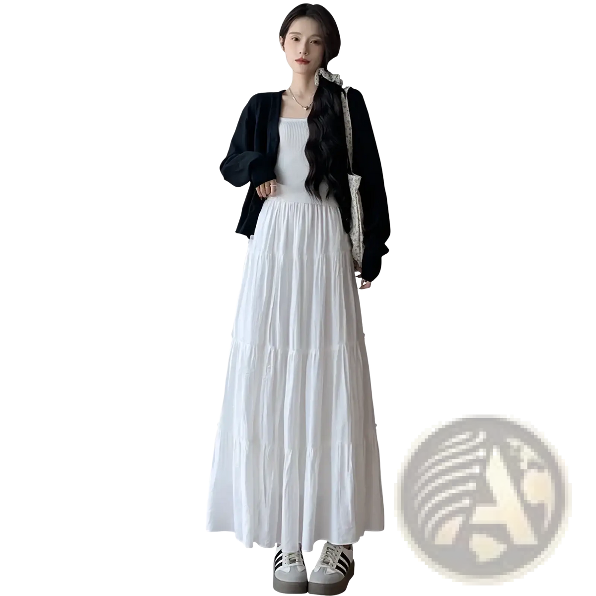 White pleated tiered maxi skirt with flowing lightweight fabric and subtle pleats for elegant casual wear