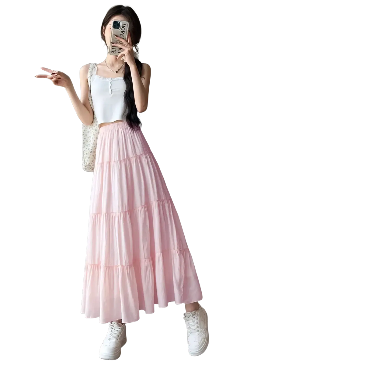 A soft pink tiered maxi skirt with flowing lightweight fabric designed as a white pleated tiered maxi skirt