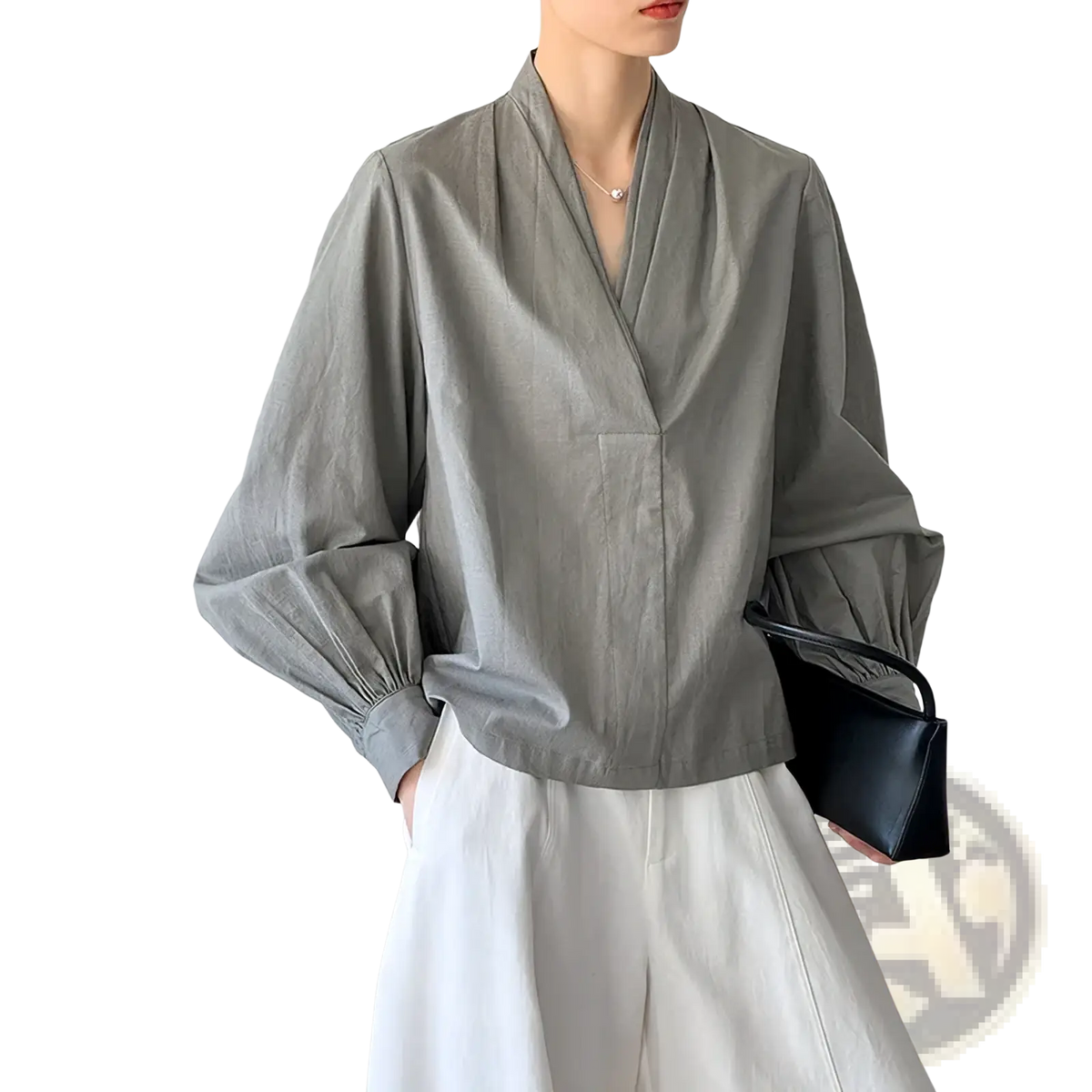 Gray lightweight linen blouse with v neck and voluminous puff sleeves in a style similar to a white puff sleeve blouse