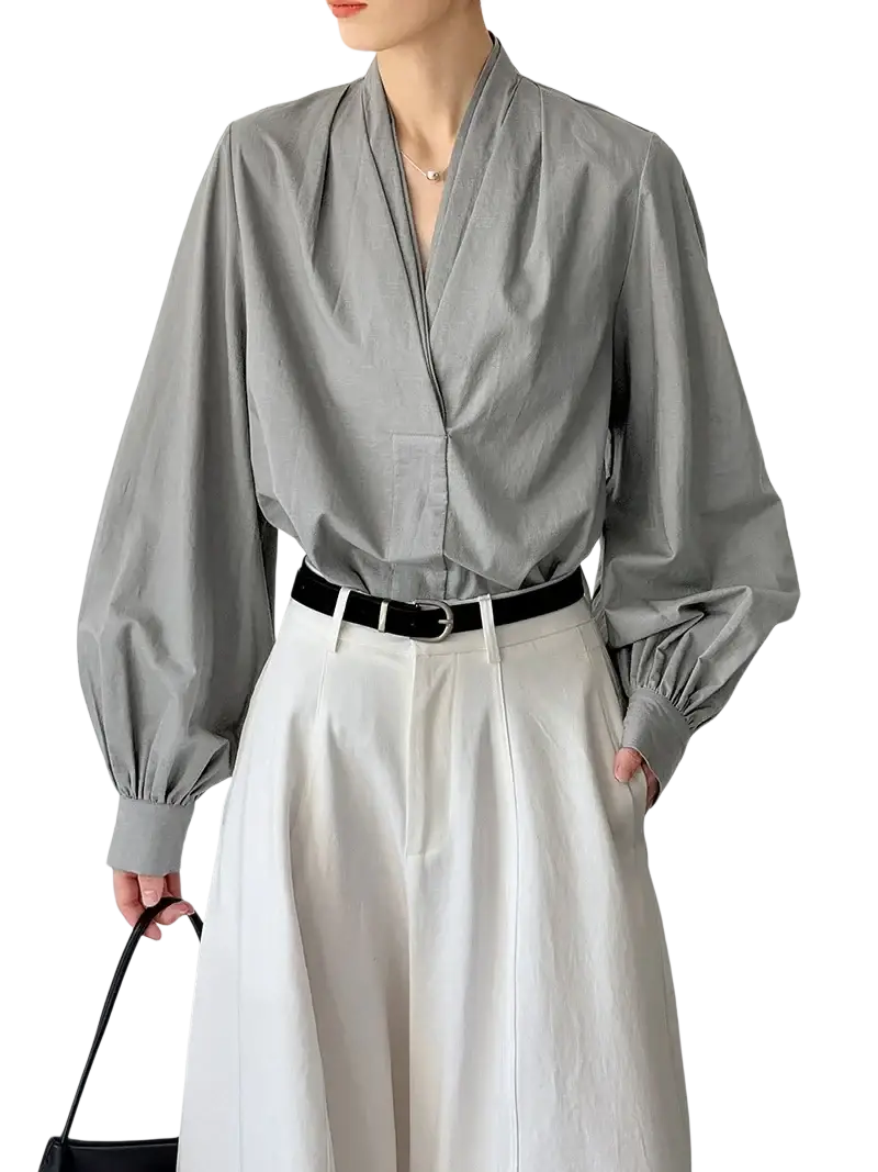 Gray long-sleeved blouse with v-neckline and gathered cuffs featured in white puff sleeve v-neck blouse product listing