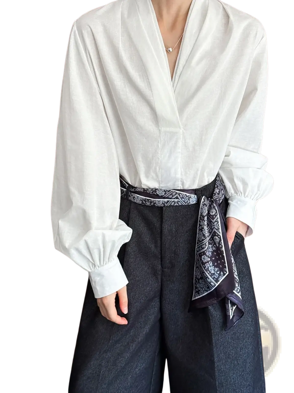 White satin puff sleeve blouse with voluminous long sleeves v-neckline tied at the waist with black patterned bandana