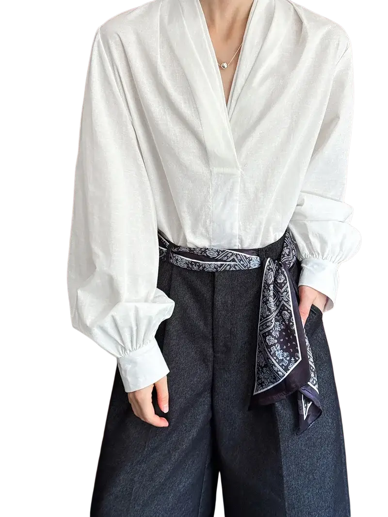 White satin puff sleeve blouse with voluminous long sleeves v-neckline tied at the waist with black patterned bandana