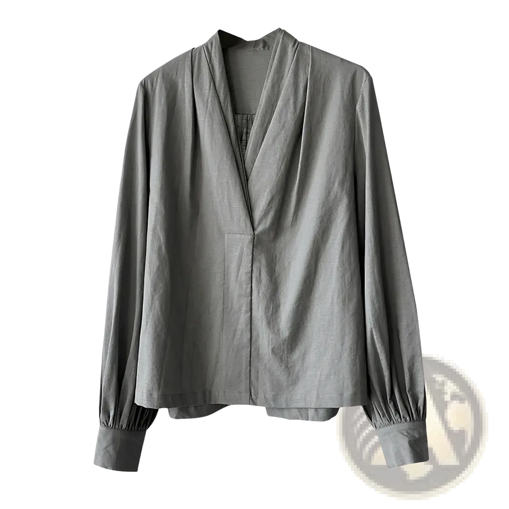 White puff sleeve v-neck blouse in soft gray fabric with draped neckline and gathered long sleeve cuffs