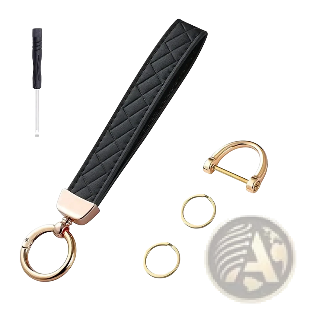 Black quilted leather key fob with rose gold-tone hardware and matching screwdriver for white quilted leather wristlet