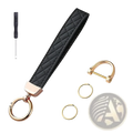 Black quilted leather key fob with rose gold-tone hardware and matching screwdriver for white quilted leather wristlet