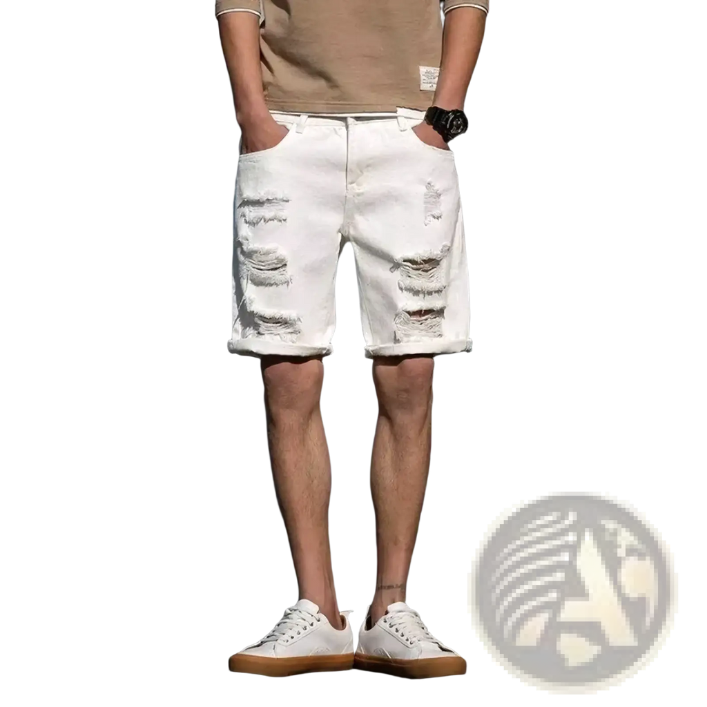 White ripped denim shorts with rolled cuffs and multiple distressed details for streetwear fashion use